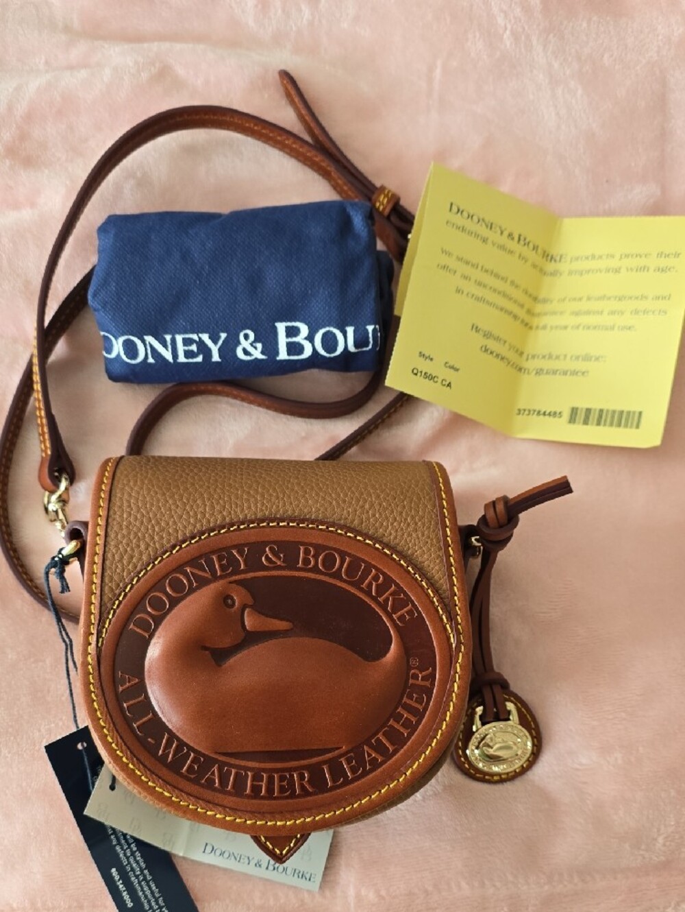 Dooney & Bourke Duck Bag In Caramel And Brown All-Weather Leather Crossbody - Picture 2 of 12
